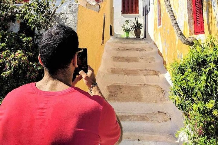 Discover charming alleyways and colorful facades in downtown Athens perfect for capturing memorable moments. Experience the blend of ancient culture and modern life while snapping stunning photos.
