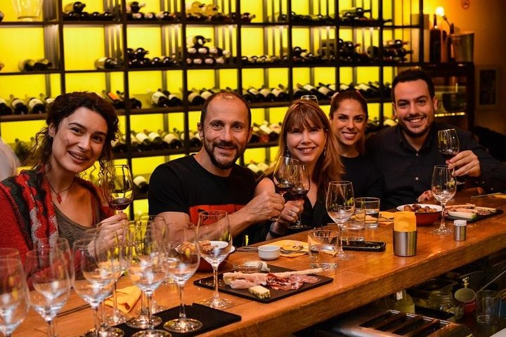 Enjoying a chat over small bites and spirits