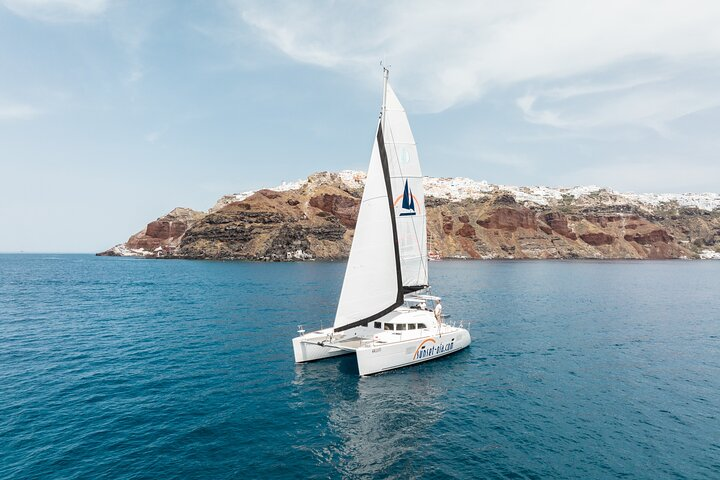 Private Morning Tour Lagoon 400-380 Sailing in Santorini ,lunch, drink, transfer - Photo 1 of 6