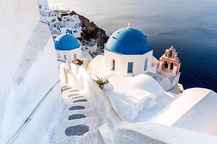 Blue Dome with three Bells in Oia town...