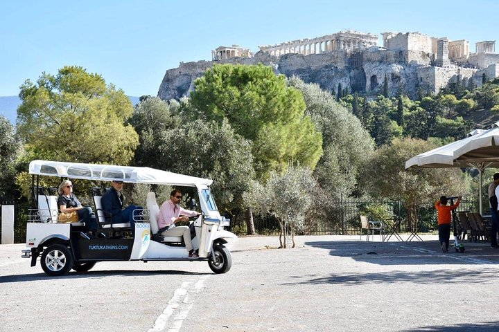Experience Athens like never before in a 100% electric Tuk Tuk enjoying stunning views of historic sites while exploring the city's rich culture with friends and family.