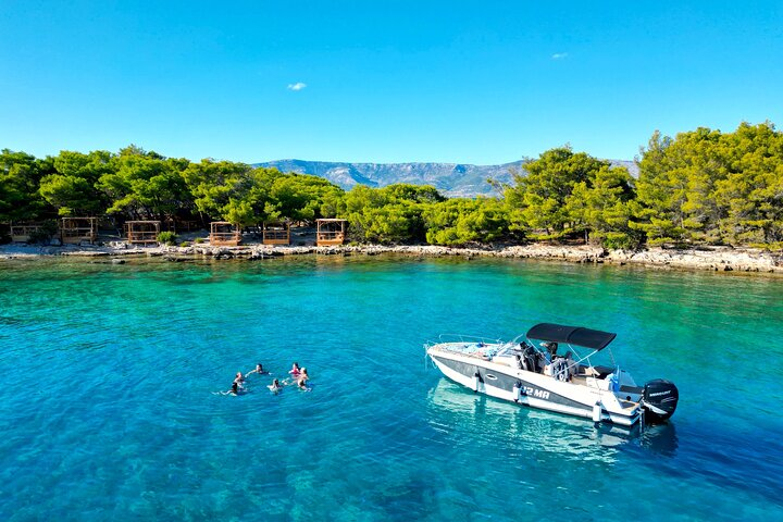 Swimming on Zecevo islet opposite Jelsa Town