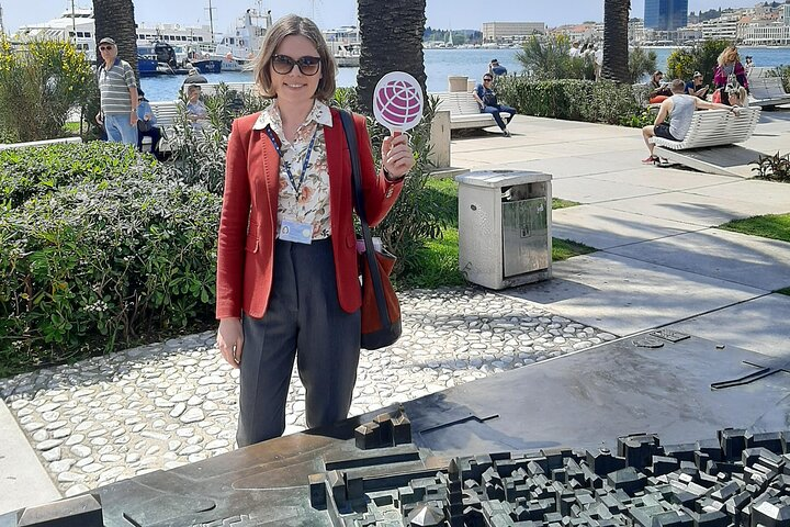 Meeting point - bronze model of the old town on Riva promenade