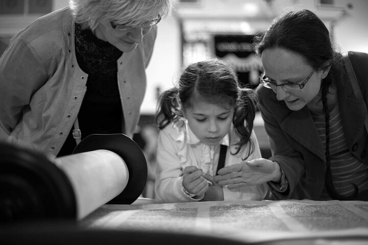 Having an amazing close look at a Torah scroll.