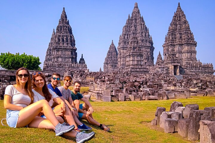 Explore the magnificent Prambanan Temple with friends experiencing the beauty of ancient architecture and surrounding landscapes while immersing in local culture and unforgettable Javanese charm.