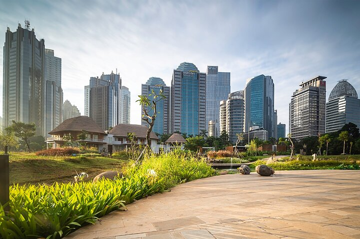 Explore Jakarta's iconic skyline where modern architecture meets lush greenery creating a perfect backdrop for memorable experiences and insights into local culture and history.