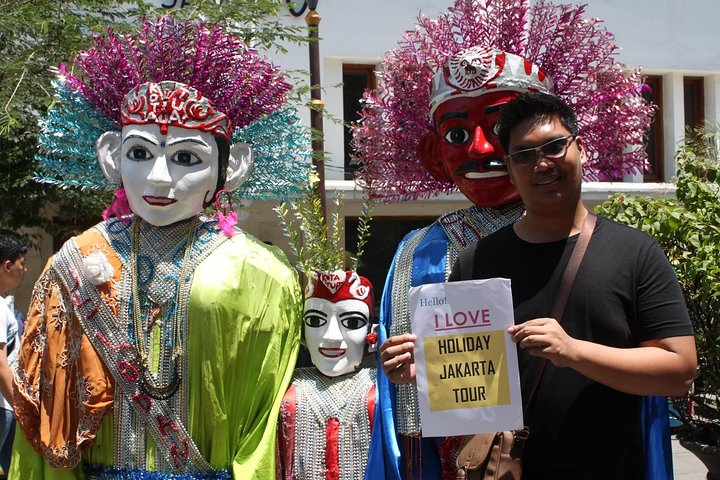 Immerse yourself in the colorful traditions of Indonesia meeting iconic puppets and locals celebrating the rich cultural tapestry that unites the archipelago's diverse heritage in Jakarta.