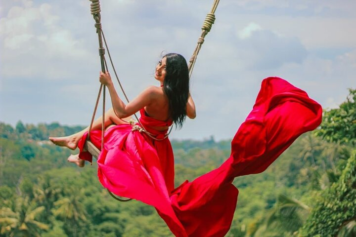 Experience the lush beauty of Ubud as you soar above the Ayung River valley. Swing high and capture unforgettable moments amidst stunning jungle views perfect for family fun and memorable photos.
