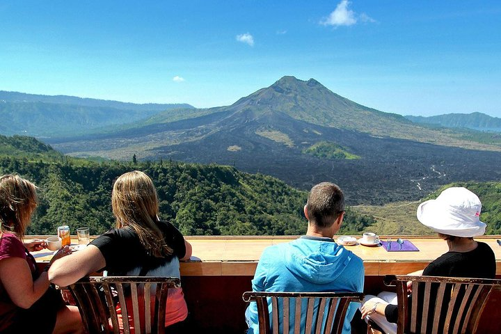 Experience the stunning vistas of Mount Batur and Lake Batur from Kintamani where breathtaking landscapes and serene moments create unforgettable memories in the heart of Bali.