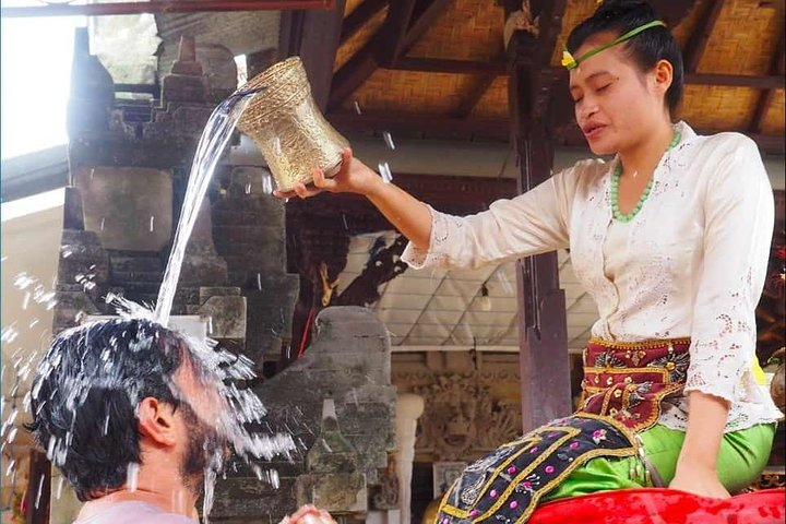 Experience the sacred purification ritual at Holy Springs Water guided by skilled Balinese healers. Embrace transformation and clarity through palm reading and spiritual consultation in stunning Ubud.