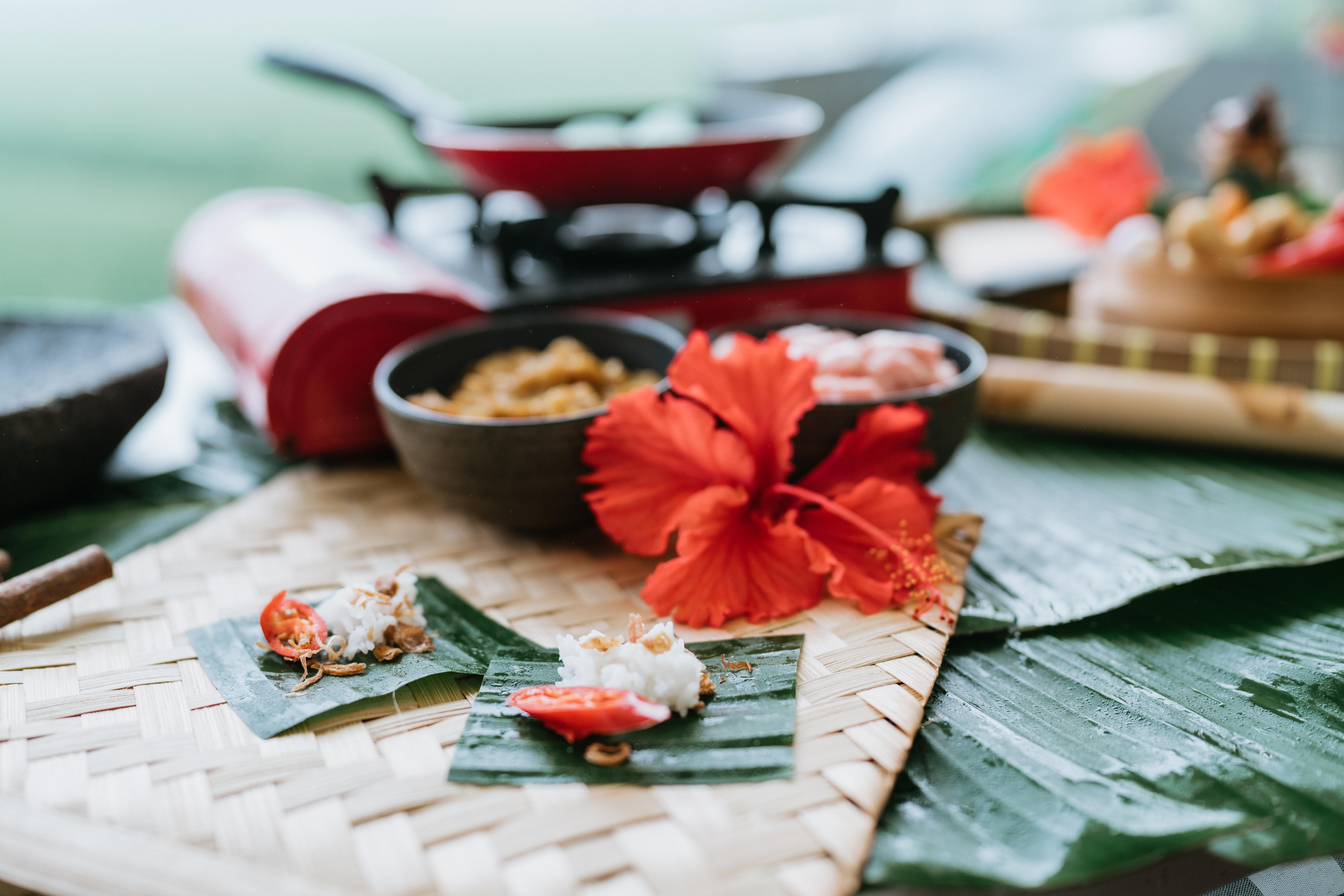 Experience the rich traditions of Balinese cooking with hands-on workshops exploring the art of preparation ritual and gratitude amidst the lush landscape of Ubud’s serene surroundings.