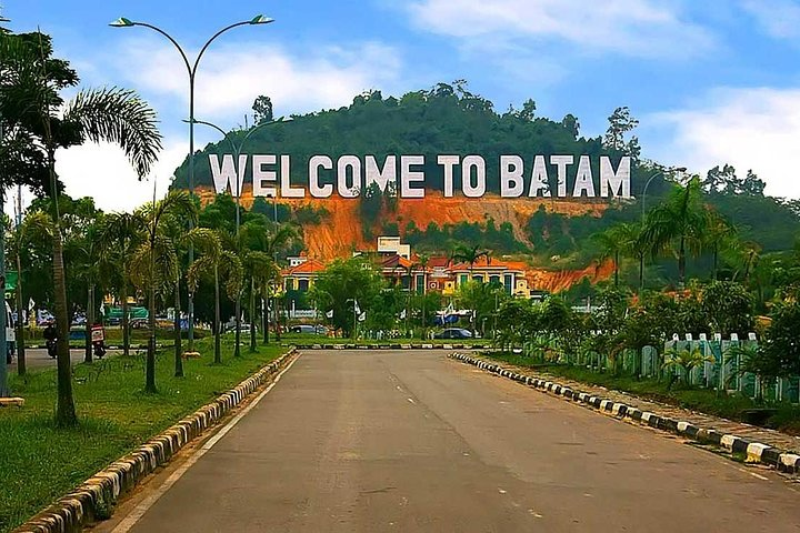 Experience the charm of Batam as you arrive at this iconic welcome scene surrounded by lush greenery and perfect for capturing memorable travel moments. Discover an island full of surprises!