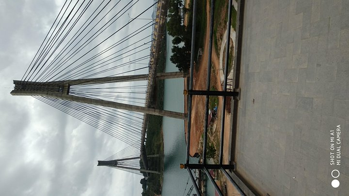 Explore stunning views from the iconic bridge in Batam where adventure meets culture. Discover the beauty of West Sumatera on a personalized journey tailored for you.