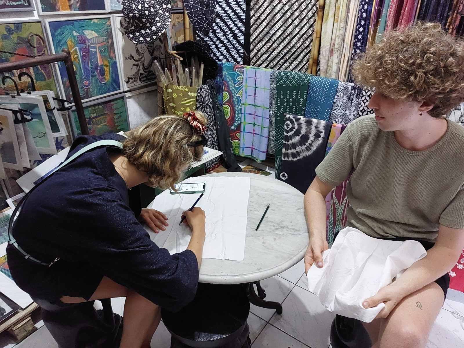 Experience the joy of creating personalized batik designs in Yogyakarta. Engage with skilled artisans exploring techniques that connect you to Indonesia's rich cultural heritage through fabric art.