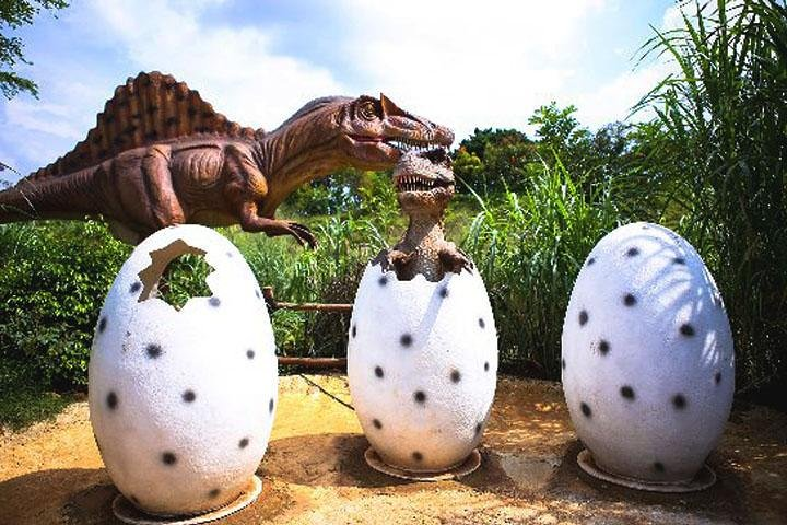Discover a playful blend of culture and imagination at Beautiful Indonesia Miniature Park where fascinating traditional houses meet charming dinosaur displays creating unforgettable memories for families.
