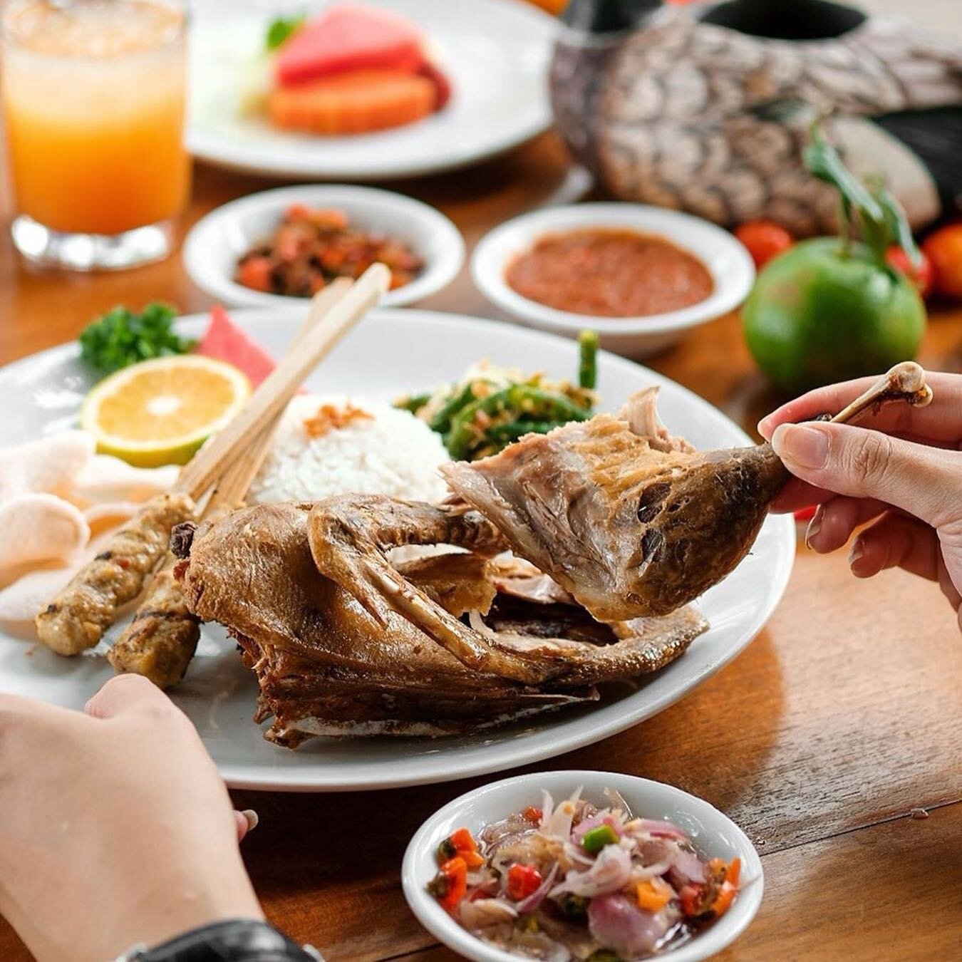 Savor the unique flavors of Bali at Bebek Bengil where the signature crispy duck and fresh local ingredients invite you to indulge in a delightful culinary journey.