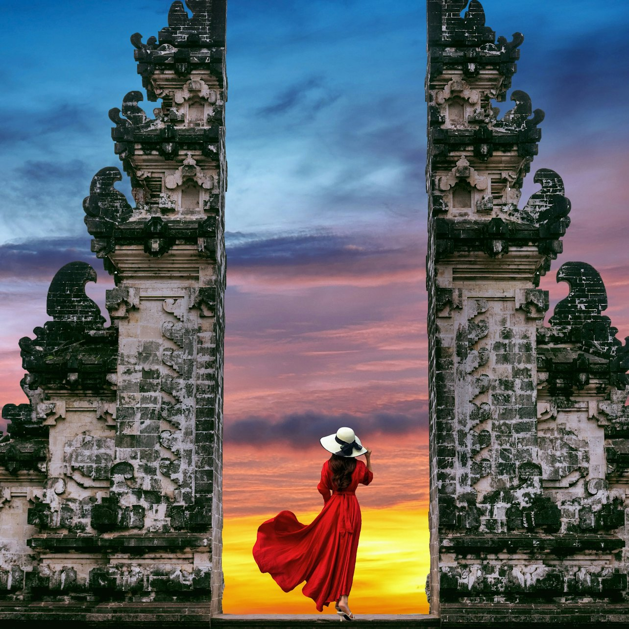 Capture the magic of Bali as the first light of dawn illuminates Lempuyang Temple’s gates creating a stunning backdrop against Mount Agung and a moment to remember.