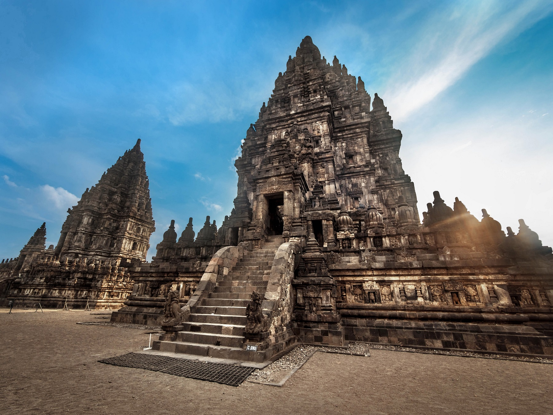 Discover the stunning architecture of Prambanan Temple where intricate carvings and majestic spires bring the rich tales of Hindu mythology to life amidst a remarkable historical landscape.