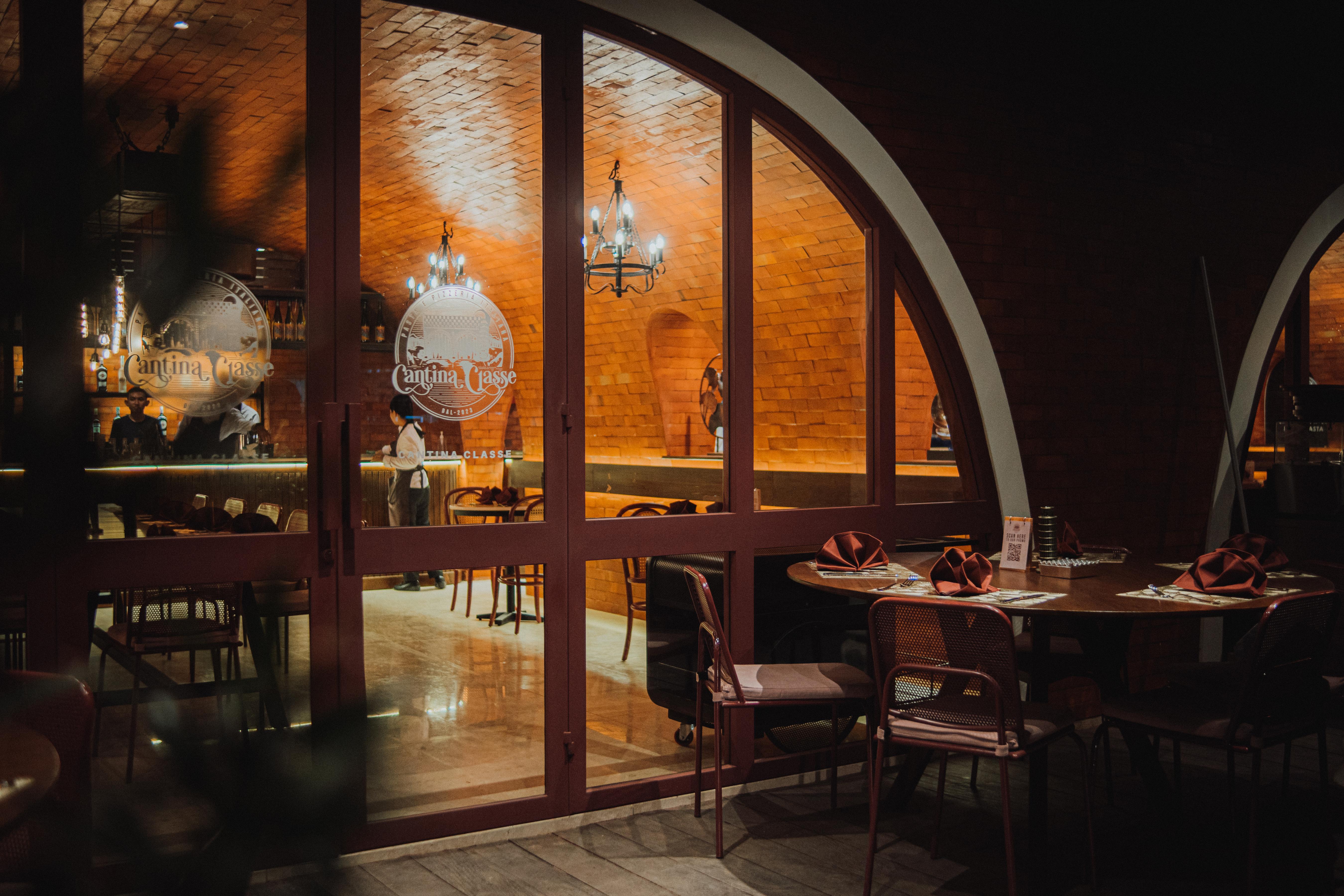 Experience a romantic dining escape at Cantina Classe Canggu where handmade pasta and pizza await amidst charming decor. Relish Italy's essence in every bite and sip.