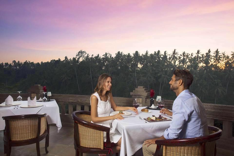 Dine amid breathtaking views of lush jungles savoring exquisite dishes that blend Indonesian and Western flavors creating a memorable culinary journey at Cascades Restaurant Viceroy Bali.