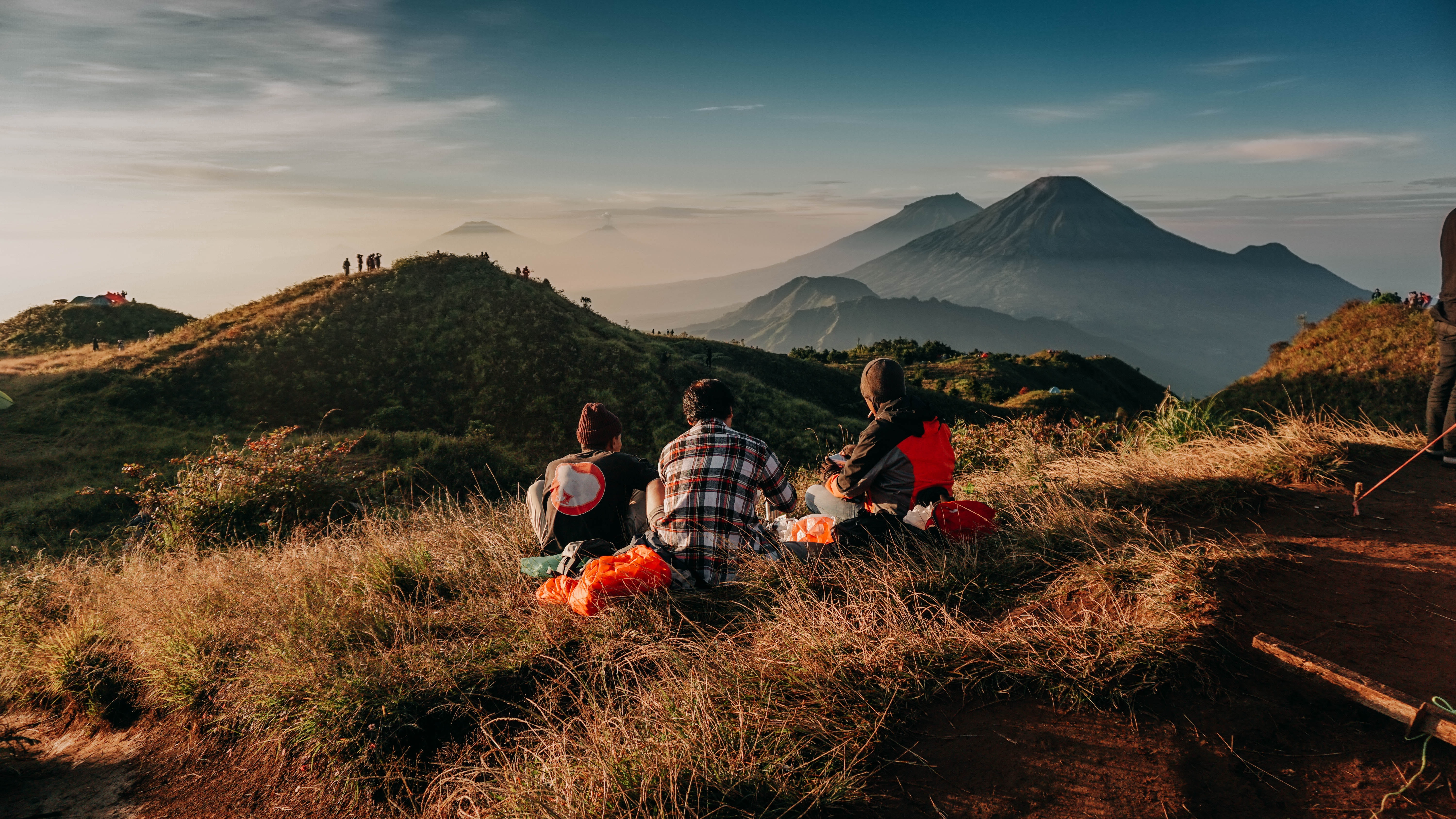 Breathe in the fresh mountain air while watching the sun rise over Sikunir Hill surrounded by stunning landscapes tranquil lakes and ancient Hindu temples waiting to be explored.