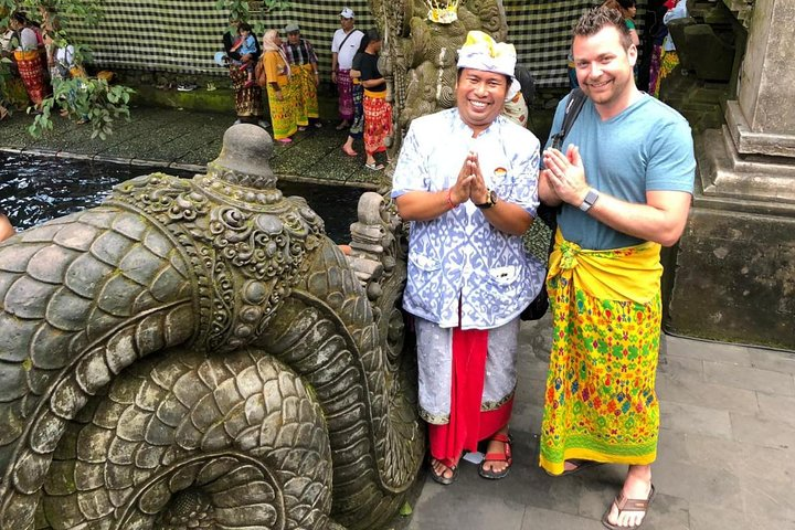 Tirta Empul Temple, Agus with client 