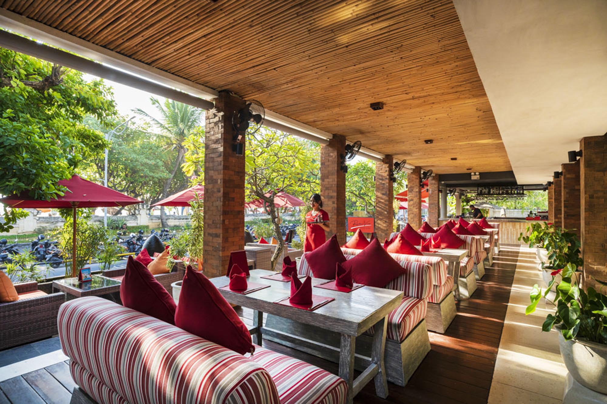 Savor authentic Italian flavors while soaking in the serene beachside views at Rosso Vivo. Perfect for unwinding with drinks as the sun sets over Kuta Beach.