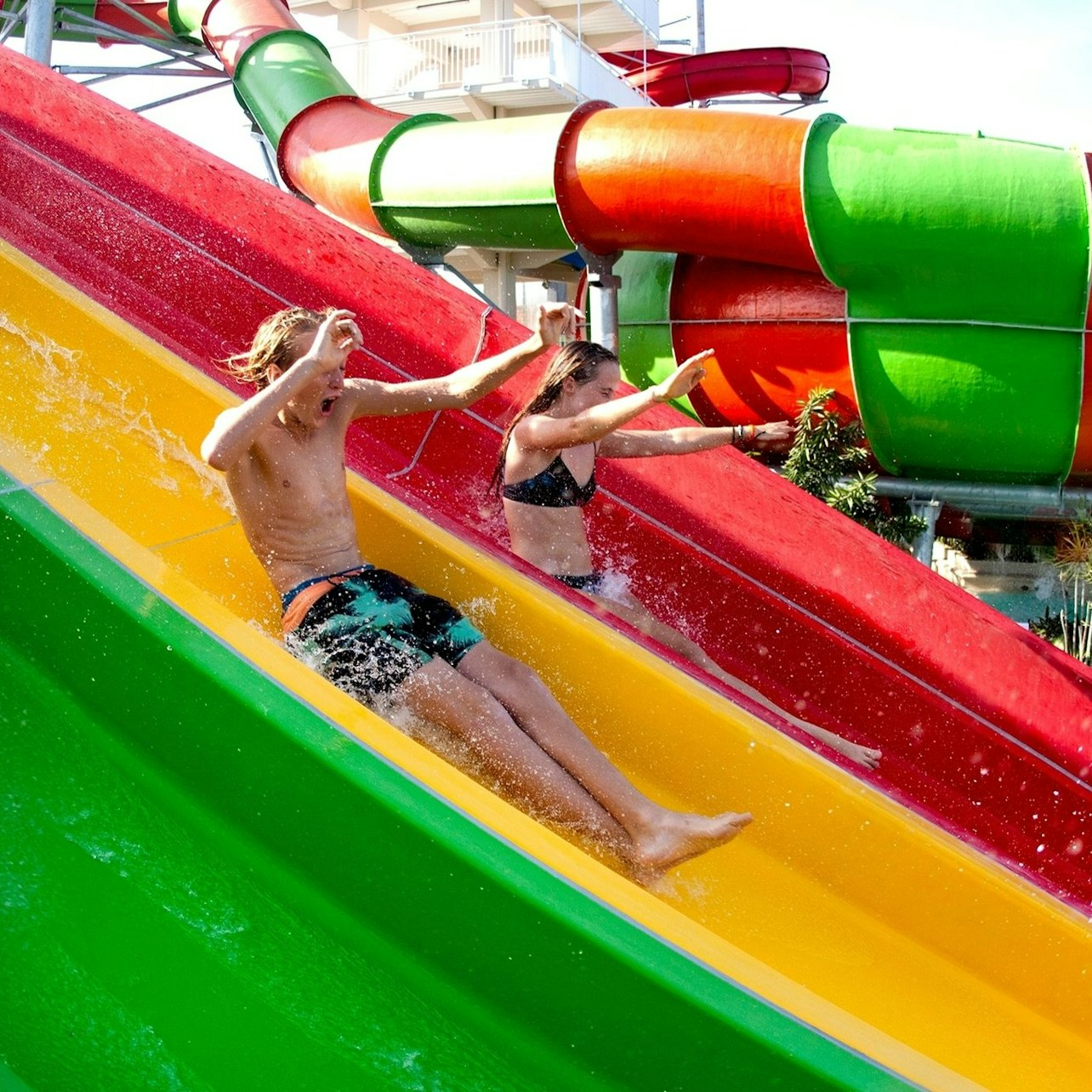 Experience the joy of sliding down colorful water slides at FINNS Beach Club where laughter fills the air and fun awaits around every corner. Dive into an unforgettable Bali day!