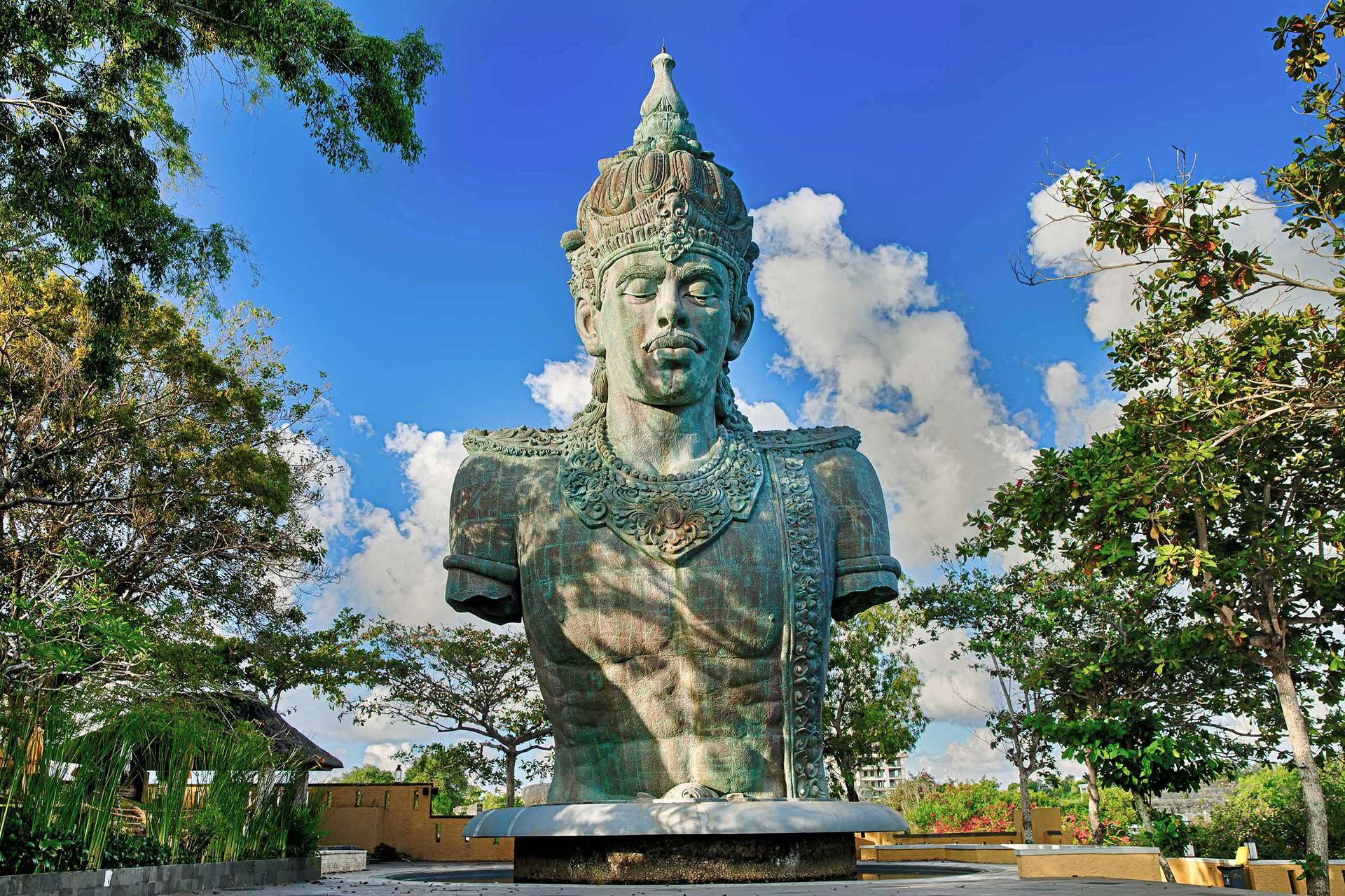 Marvel at the majestic Garuda Wisnu Kencana statue a symbol of Indonesia’s heritage rising proudly against the serene Bali skies. Discover this monumental masterpiece in the heart of Bali.