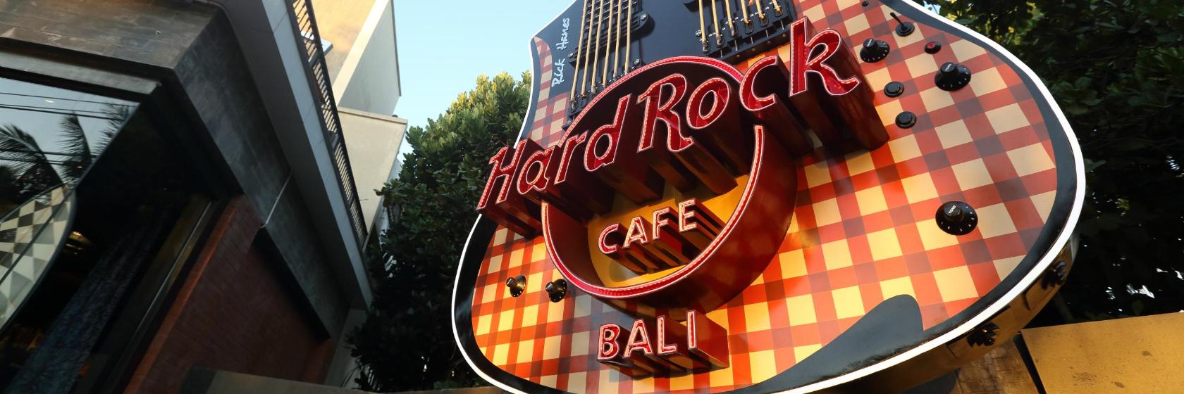 The iconic Hard Rock Cafe Bali blends delicious local flavors with live music just steps away from Kuta Beach and popular shopping spots making it a must-visit for travelers.