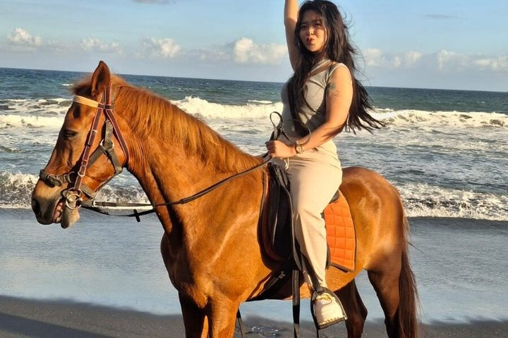Horse Riding With Sunset View Of Black Sand Beach - Photo 1 of 5
