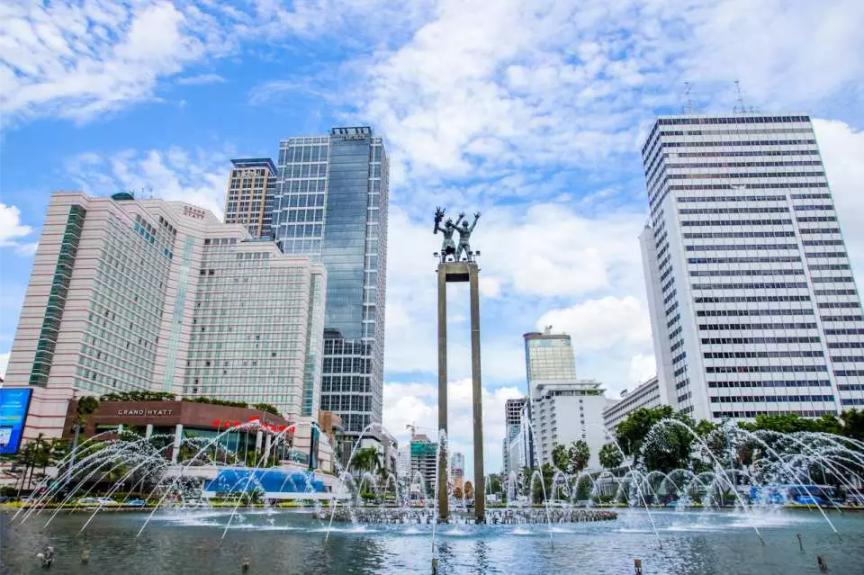 Explore Jakarta's dynamic urban scene where modern skyscrapers meet refreshing water displays inviting you to discover the city's unique blend of culture food and public spaces.