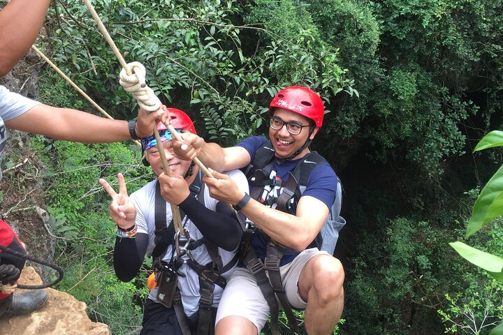 Experience the rush of adventure as you zip-line through lush jungles capturing the essence of camaraderie and excitement during your unforgettable day in Yogyakarta.