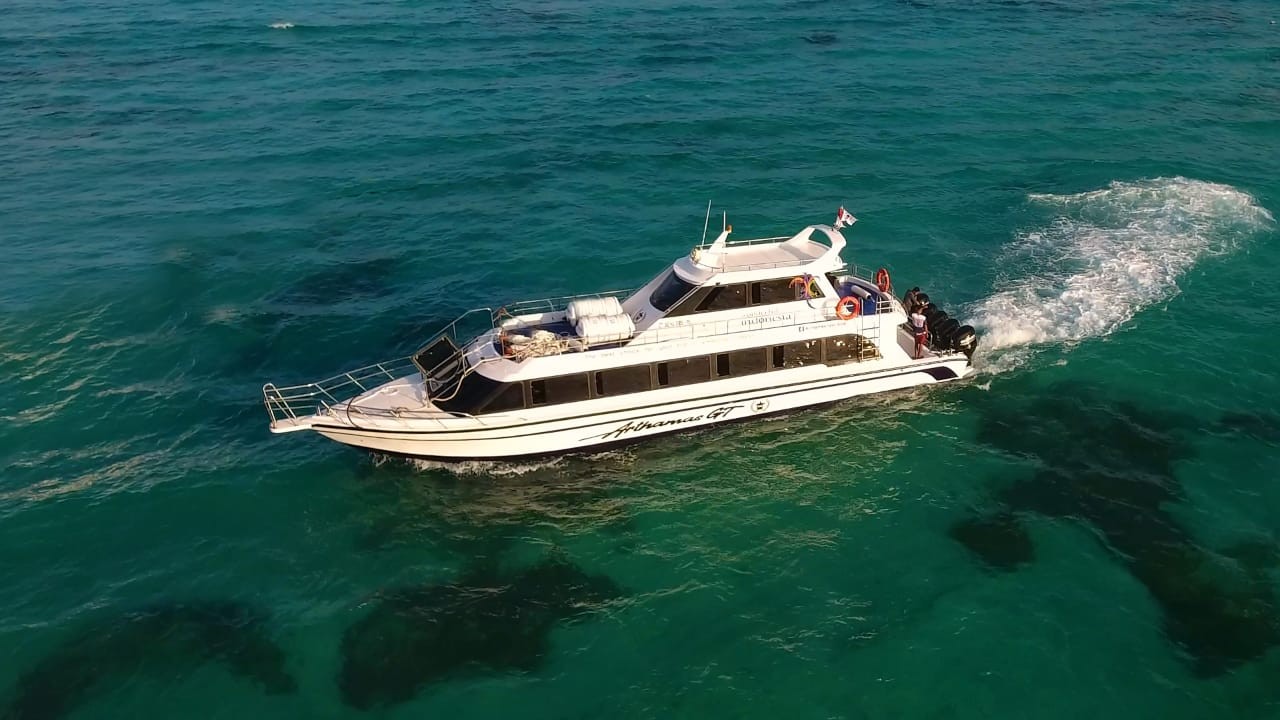 Experience smooth sailing with the Fast Boat to Nusa Lembongan navigating crystal-clear waters ready to uncover hidden beaches and pristine reefs. Adventure awaits on this scenic escape.