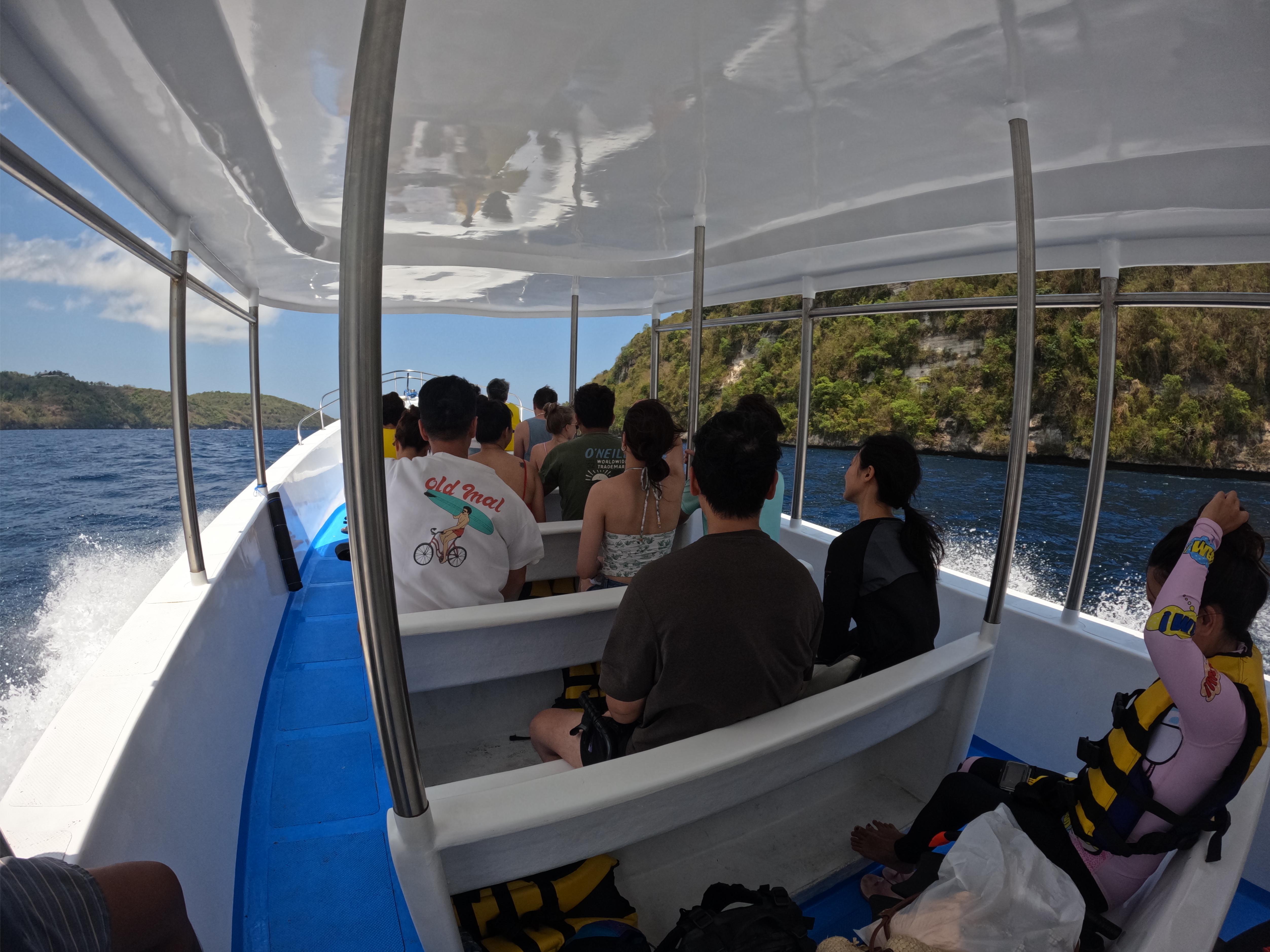 Experience the stunning views of Nusa Lembongan as you cruise through turquoise waters savoring the beauty of coastal scenery and the iconic Yellow Bridge. Adventure awaits!