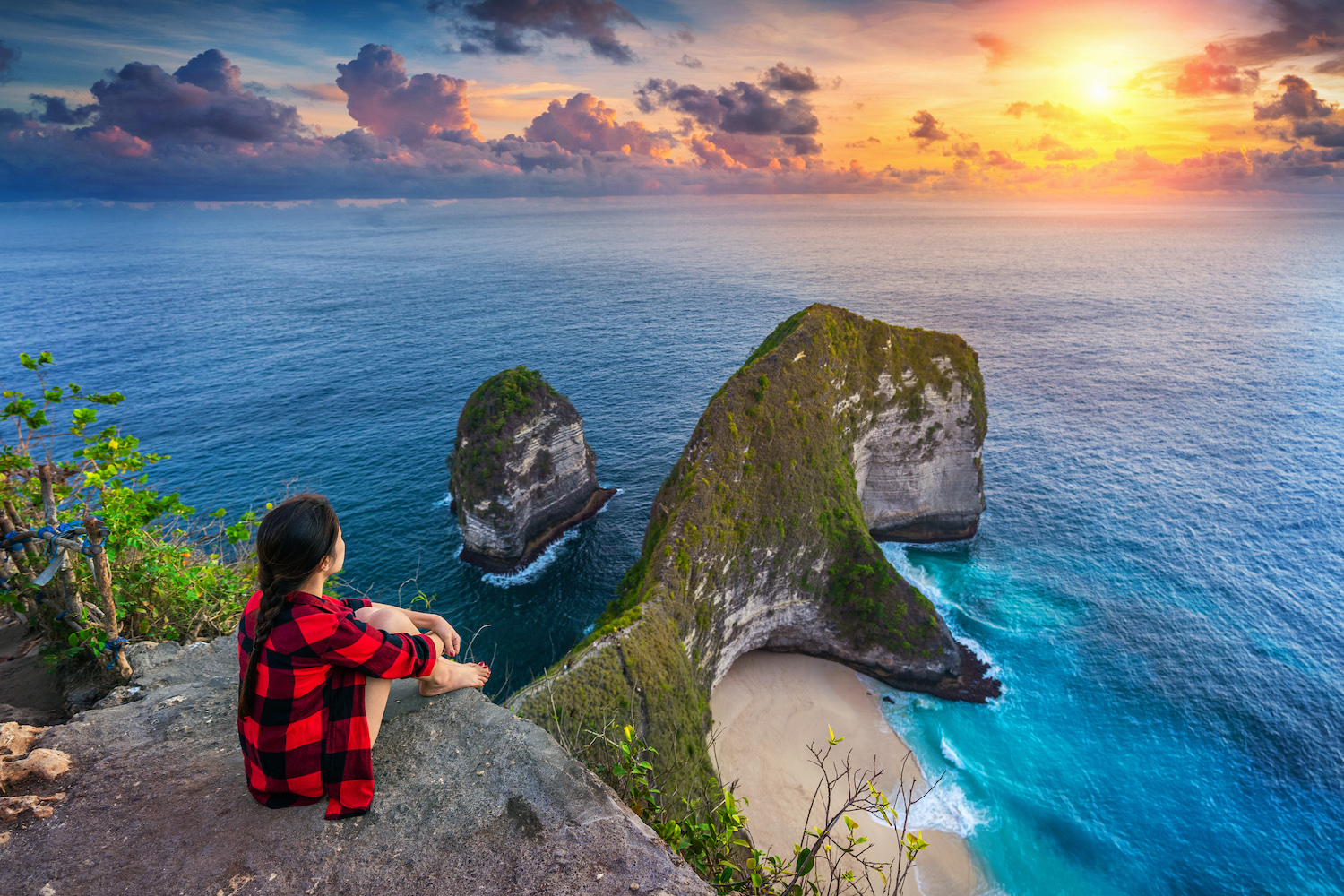 Experience breathtaking views at Kelingking Beach where dramatic cliffs meet the Indian Ocean creating the perfect backdrop for unforgettable moments on your island adventure.