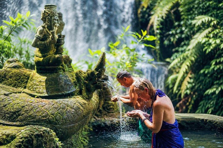 Purification Holy Bath at Beji Gria Waterfall - Photo 1 of 21