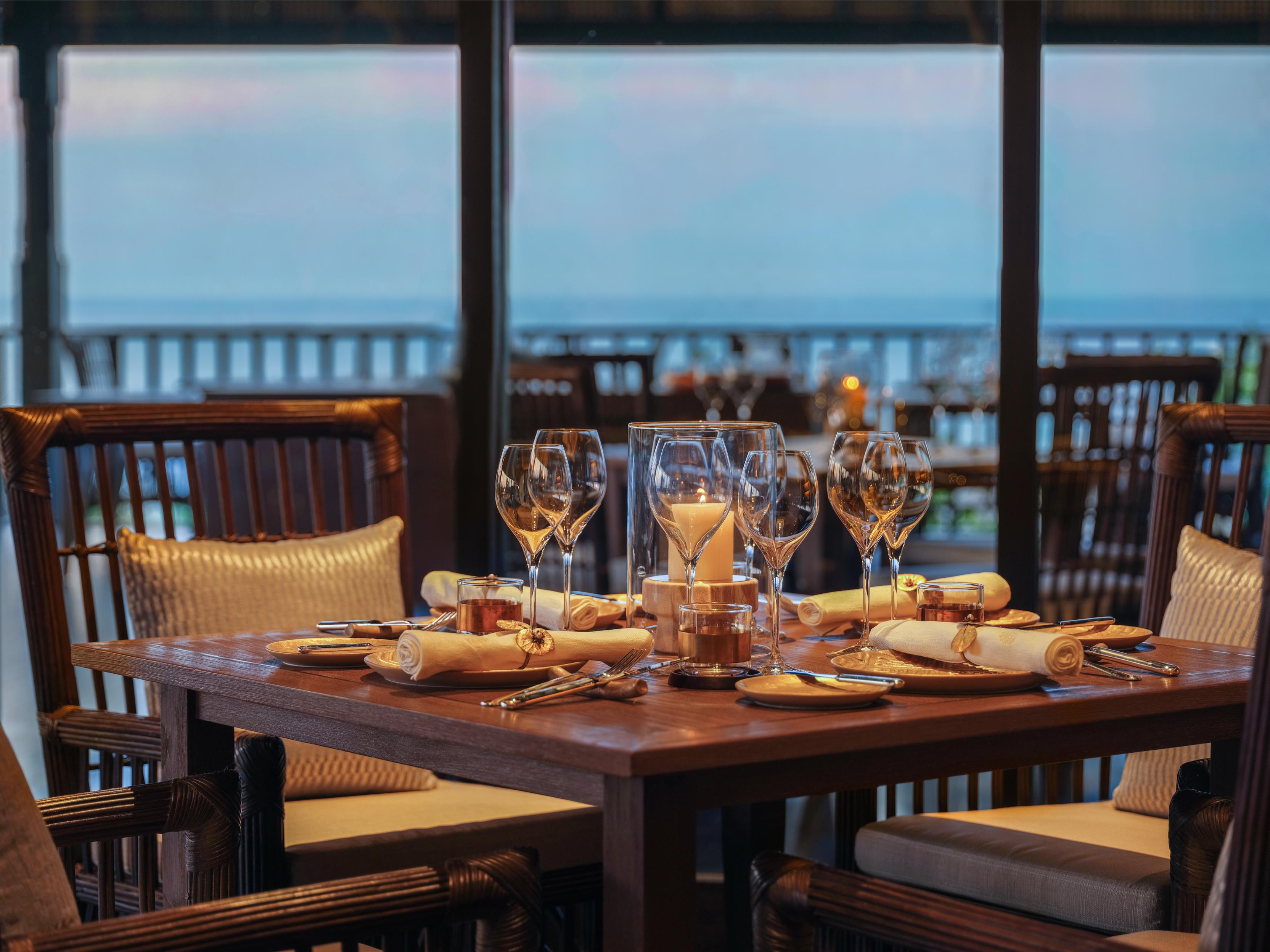 Savor the essence of Bali at Rumari Restaurant where exquisite cuisine merges with stunning views of Jimbaran Bay creating an unforgettable dining experience infused with local flavors.