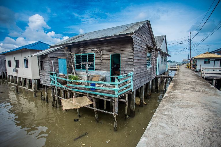 Experience the unique charm of Senggarang Village where traditional stilt houses meet serene waters inviting exploration and a glimpse into the lives of its historic community.