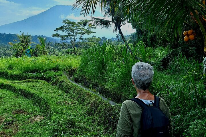 Explore the lush rice fields and witness the daily rhythms of Sidemen village all while enjoying stunning views of Mount Agung a perfect escape for nature lovers.