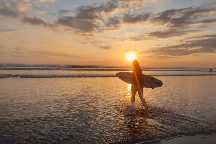 Come for a sunset surf with us