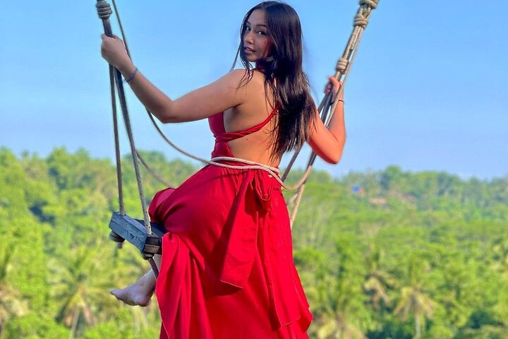 Experience the beauty of Ubud with stunning jungle swings and picturesque views over the Ayung River perfect for capturing lasting memories with loved ones in a serene setting.