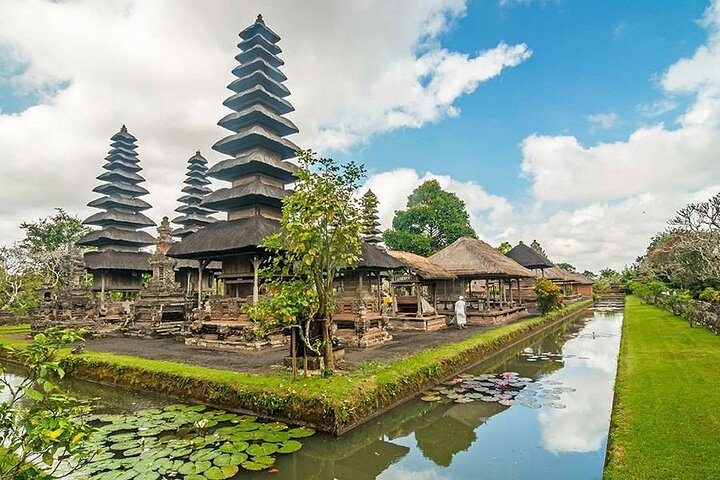 Bali's timeless allure unfolds through ancient temples serene waterways and lush greenery inviting travelers to immerse in its natural charm and cultural richness. A true paradise for nature seekers.