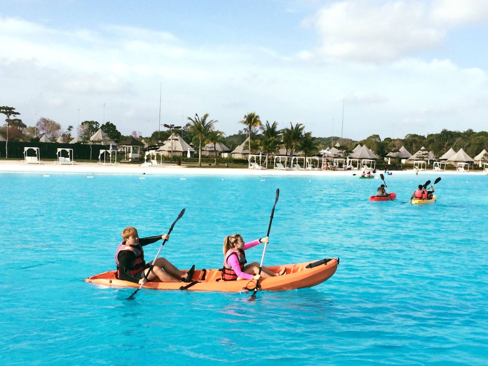 Explore the crystal-clear waters of Treasure Bay Bintan where kayaking and water activities await amidst stunning scenery and sandy shores perfect for family fun and relaxation.