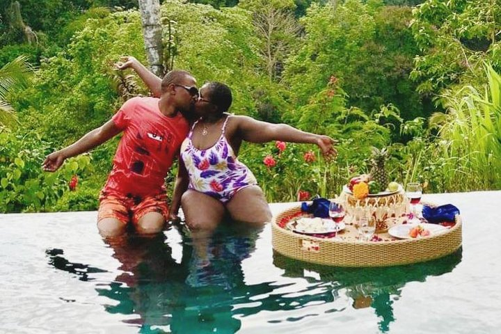 romantic lunch served by floating in the pool