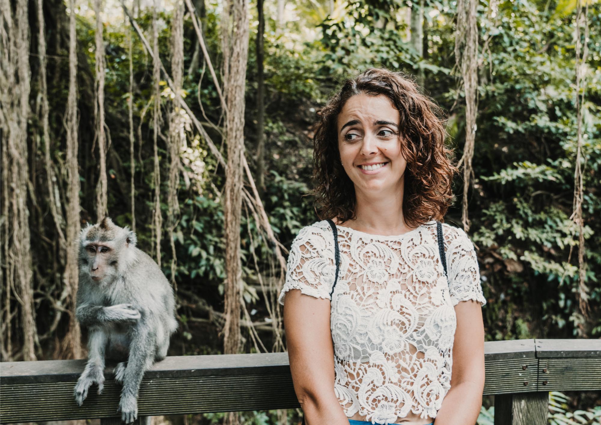Explore the lush surroundings of Ubud Sacred Monkey Forest Sanctuary where playful monkeys and serene nature create unforgettable encounters during an immersive walking tour. Discover the harmony of wildlife and conservation.