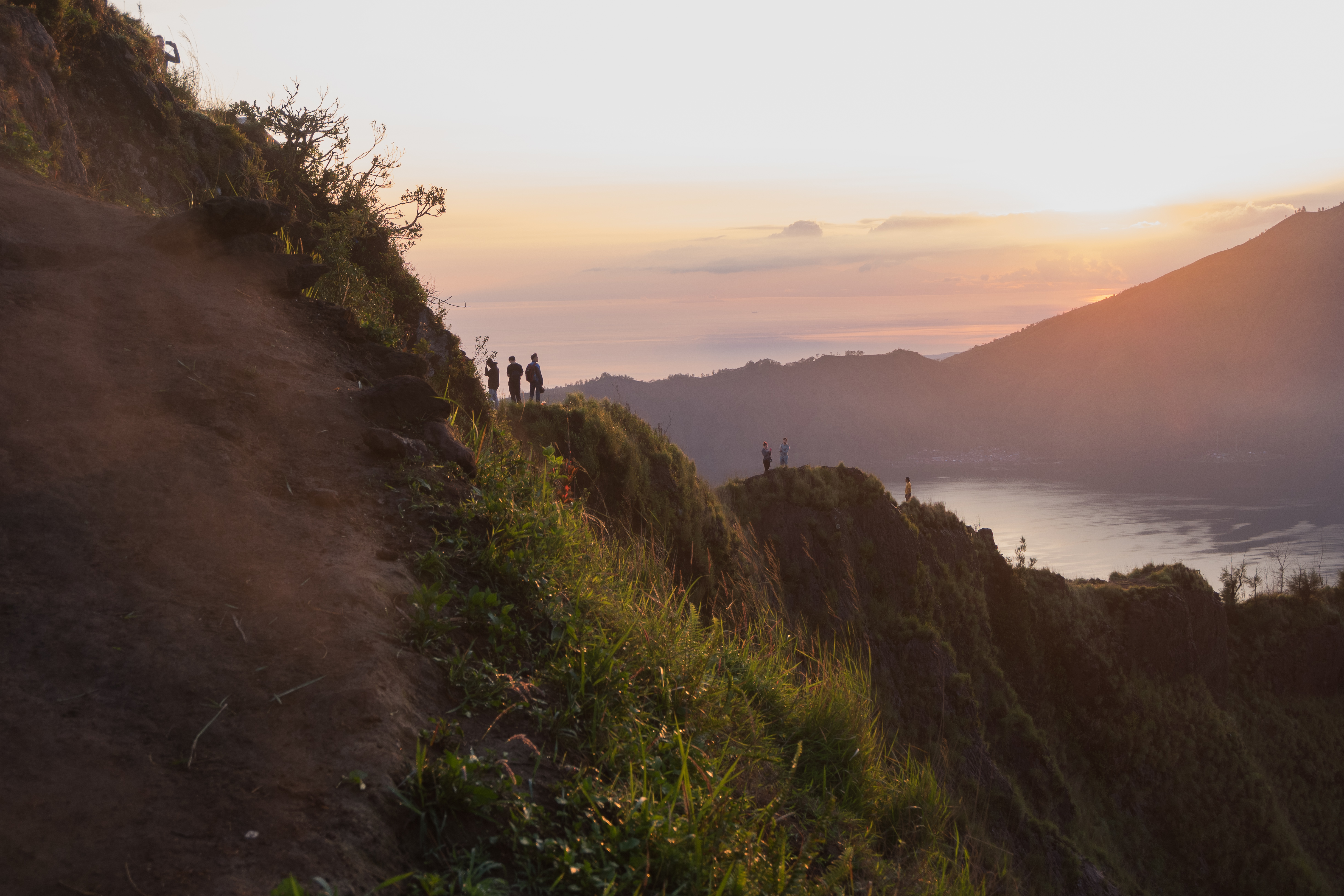 Experience the breathtaking views atop Mount Batur at sunrise surrounded by lush landscapes. After the trek unwind in natural hot springs and visit a local coffee plantation.