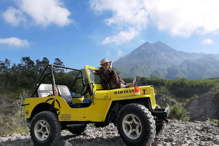 Experience the rugged beauty of Merapi's landscape aboard a private jeep exploring volcanic remnants and unique geological formations while learning about the area's history from your guide.