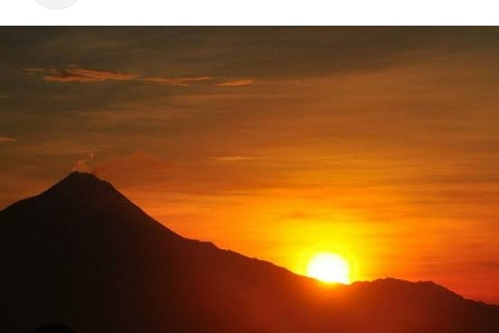 Experience breathtaking sunrises over Merapi Volcano creating unforgettable moments as you explore Yogyakarta's stunning landscapes and rich historical sites like Borobudur and Prambanan.