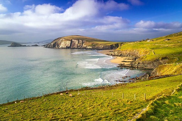 Experience the stunning coastline of Ireland where rolling green hills meet crystal-clear waters perfect for wandering and capturing unforgettable memories on your journey.